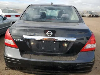 2009 Nissan Versa 1.8 S with VIN 3N1BC11E19L382395, listed as a Copart auction lot 41666375 with 153,899 mi miles and Salvage Title. Bid and sale history available at carsss.com. Image 6.