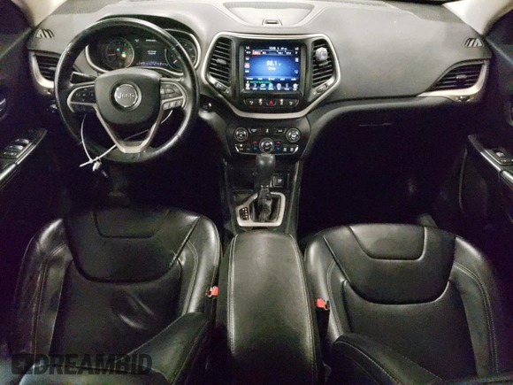 2014 Jeep Cherokee Limited with VIN 1C4PJLDS9EW241374, listed as a Copart auction lot 61048025 with 77,697 mi miles and Salvage title. Bid and sale history available at DreamBid. Image 8.