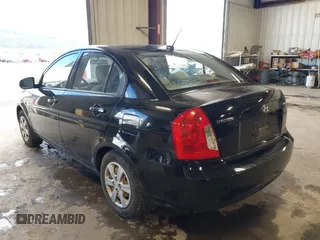 2011 Hyundai Accent GLS z VIN KMHCN4AC1BU620314, wystawiony jako IAAI lot #42228847 z przebiegiem 144 313 mil mil oraz . Historia ofert i sprzedaży dostępna na DreamBid. Obrazek 3.
