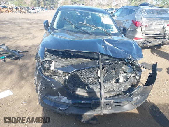 2019 Mazda CX-5 Touring with VIN JM3KFBCM6K0513037, listed as a IAAI auction lot 42121789 with 59,455 mi miles and . Bid and sale history available at DreamBid. Image 12.
