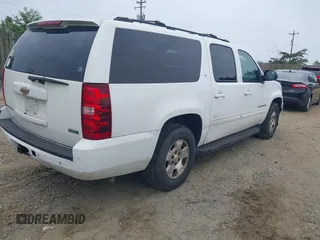 2010 Chevrolet Suburban LT z VIN 1GNUCJE01AR199247, wystawiony jako IAAI lot #42365497 z przebiegiem 289 944 mil mil oraz . Historia ofert i sprzedaży dostępna na DreamBid. Obrazek 4.