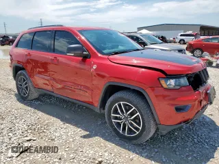 2020 Jeep Grand Cherokee Trailhawk with VIN 1C4RJFLGXLC116714, listed as a Copart auction lot 60298185 with 62,240 mi miles and Salvage title. Bid and sale history available at DreamBid. Image 4.