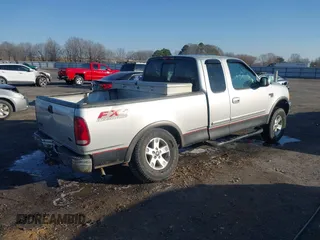 2003 Ford F-150 XL z VIN 1FTRX18W53NA29776, wystawiony jako IAAI lot #41413445 z przebiegiem 231 533 mil mil oraz . Historia ofert i sprzedaży dostępna na DreamBid. Obrazek 4.