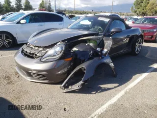 2017 Porsche 718 Boxster z VIN WP0CA2A81HS221942, wystawiony jako Copart lot #36581523 z przebiegiem 73 954 mil mil oraz . Historia ofert i sprzedaży dostępna na DreamBid. Obrazek 1.