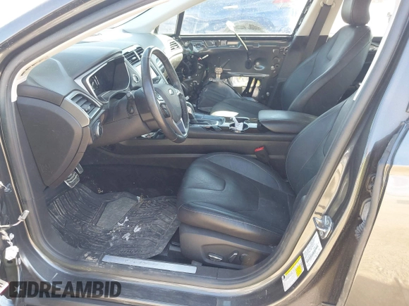 2016 Ford Fusion Titanium Hybrid с VIN 3FA6P0RU8GR266488, выставлен на аукционе IAAI как лот 41903919 с пробегом 74 927 миль миль и . История ставок и продаж доступна на DreamBid. Изображение 5.