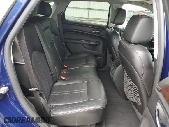 2012 Cadillac SRX Performance Collection with VIN 3GYFNBE35CS579214, listed as a Copart auction lot 54725465 with 114,829 mi miles and Salvage title. Bid and sale history available at DreamBid. Image 11.