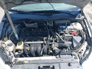 2008 Ford Focus SE with VIN 1FAHP35N88W271973, listed as a IAAI auction lot 42090204 with 261,457 mi miles. Bid and sale history available at carsss.com. Image 10.