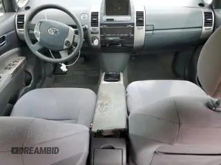 2006 Toyota Prius z VIN JTDKB20U867527026, wystawiony jako Copart lot #59057765 z przebiegiem 248 523 mil mil oraz Nie do naprawy • Non repairable. Historia ofert i sprzedaży dostępna na DreamBid. Obrazek 8.
