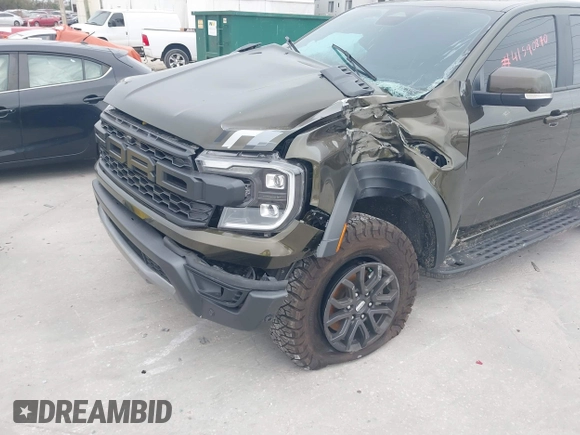 2024 Ford Ranger Raptor with VIN 1FTER4LR2RLE05950, listed as a IAAI auction lot 41590870 with 10,891 mi miles. Bid and sale history available at carsss.com. Image 6.