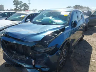 2017 Mazda CX-5 Grand Touring with VIN JM3KFADL8H0105518, listed as a IAAI auction lot 41876779 with 82,540 mi miles. Bid and sale history available at carsss.com. Image 6.