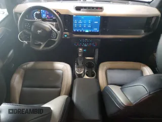 2023 Ford Bronco z VIN 1FMEE5DP9PLC00732, wystawiony jako Copart lot #60123165 z przebiegiem 10 672 mil mil oraz Szkoda całkowita • Salvage title. Historia ofert i sprzedaży dostępna na DreamBid. Obrazek 8.