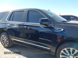2021 GMC Yukon Denali with VIN 1GKS2DKL1MR135771, listed as a IAAI auction lot 41403680 with 61,772 mi miles. Bid and sale history available at carsss.com. Image 13.