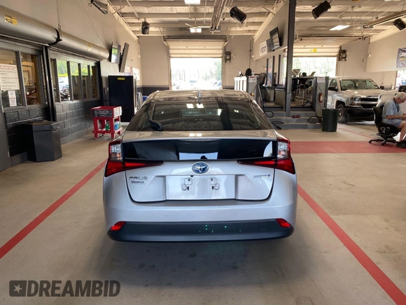 2020 Toyota Prius L Eco z VIN JTDKARFU2L3107977, wystawiony jako IAAI lot #42571708 z przebiegiem 204 781 mil mil oraz . Historia ofert i sprzedaży dostępna na DreamBid. Obrazek 11.