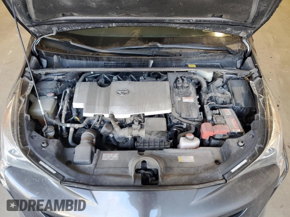 2016 Toyota Prius Four z VIN JTDKARFU2G3508628, wystawiony jako Copart lot #54727495 z przebiegiem Nie podano mil oraz Szkoda całkowita • Salvage title. Historia ofert i sprzedaży dostępna na DreamBid. Obrazek 12.