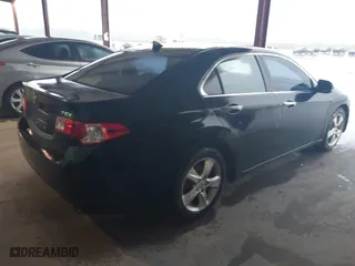 2009 Acura TSX with VIN JH4CU26629C004182, listed as a IAAI auction lot 42086811 with 206,526 mi miles. Bid and sale history available at carsss.com. Image 4.