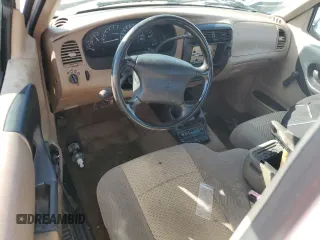 1999 Mazda B-Series 2WD Truck SX with VIN 4F4YR12C4XTM40289, listed as a Copart auction lot 77544354 with 192,046 mi miles and Salvage Title. Bid and sale history available at carsss.com. Image 8.