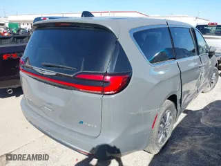 2023 Chrysler Pacifica Hybrid Touring L with VIN 2C4RC1L75PR599135, listed as a IAAI auction lot 39785830 with 28,781 mi miles. Bid and sale history available at carsss.com. Image 4.
