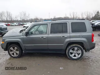 2013 Jeep Patriot Latitude with VIN 1C4NJPFB8DD218948, listed as a IAAI auction lot 41072937 with 126,140 mi miles and . Bid and sale history available at carsss.com. Image 14.