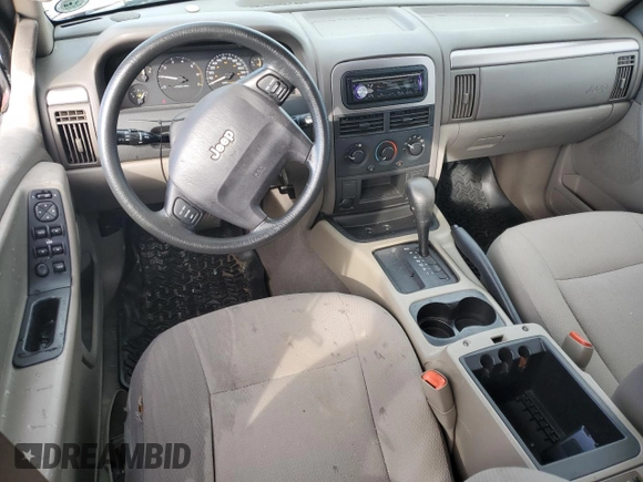 2004 Jeep Grand Cherokee Laredo z VIN 1J4GX48S24C348436, wystawiony jako Copart lot #61930385 z przebiegiem 97 536 mil mil oraz Szkoda całkowita • Salvage title. Historia ofert i sprzedaży dostępna na DreamBid. Obrazek 8.
