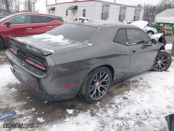 2016 Dodge Challenger SRT 392 with VIN 2C3CDZDJ1GH125463, listed as a IAAI auction lot 41277945 with 36,495 mi miles. Bid and sale history available at carsss.com. Image 4.