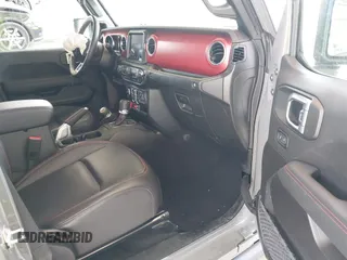 2022 Jeep Gladiator Rubicon with VIN 1C6JJTBG6NL166081, listed as a IAAI auction lot 42204431 with 40,568 mi miles and . Bid and sale history available at DreamBid. Image 5.