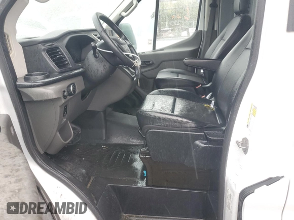 2021 Ford Transit Cargo with VIN 1FTBR1X84MKA38597, listed as a Copart auction lot 71813334 with 141,505 mi miles and Clean Title. Bid and sale history available at DreamBid. Image 7.