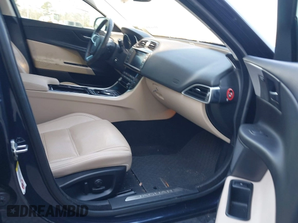 2018 Jaguar XE 25t Prestige with VIN SAJAK4FXXJCP36634, listed as a IAAI auction lot 41661035 with 56,099 mi miles. Bid and sale history available at carsss.com. Image 5.