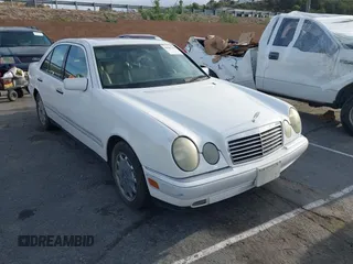 1997 Mercedes-Benz E-Class with VIN WDBJF55F8VJ031834, listed as a IAAI auction lot 41901306 with 1 mi miles. Bid and sale history available at carsss.com. Image 1.