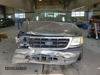 2003 Ford F-150 XL with VIN 1FTRX17263NA82310, listed as a Copart auction lot 76577354 with Not provided miles and Salvage title. Bid and sale history available at DreamBid. Image 5.