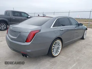 2018 Cadillac CT6 Luxury RWD z VIN 1G6KC5RX4JU159789, wystawiony jako IAAI lot #41145010 z przebiegiem 73 811 mil mil oraz . Historia ofert i sprzedaży dostępna na DreamBid. Obrazek 4.