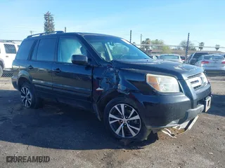 2006 Honda Pilot EX-L with VIN 5FNYF28586B037160, listed as a IAAI auction lot 41798991 with 207,486 mi miles. Bid and sale history available at carsss.com. Image 13.