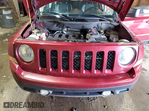 2016 Jeep Patriot High Altitude with VIN 1C4NJRFBXGD597578, listed as a Copart auction lot 58857115 with 128,911 mi miles and Salvage title. Bid and sale history available at DreamBid. Image 12.