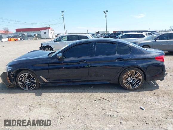 2019 BMW 5 Series M550i xDrive with VIN WBAJB9C51KB288853, listed as a IAAI auction lot 41905019 with Not provided miles and . Bid and sale history available at DreamBid. Image 14.
