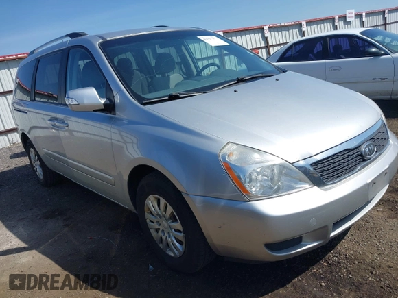 2012 Kia Sedona LX with VIN KNDMG4C70C6491703, listed as a IAAI auction lot 42128411 with 246,586 mi miles. Bid and sale history available at carsss.com. Image 1.
