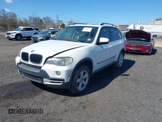 2008 BMW X5 3.0si with VIN 5UXFE43528L023170, listed as a IAAI auction lot 41892624 with 154,544 mi miles. Bid and sale history available at carsss.com. Image 2.