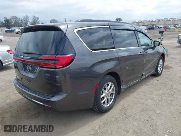 2022 Chrysler Pacifica Touring L z VIN 2C4RC1BG0NR134194, wystawiony jako IAAI lot #42082795 z przebiegiem 98 845 mil mil oraz . Historia ofert i sprzedaży dostępna na DreamBid. Obrazek 4.
