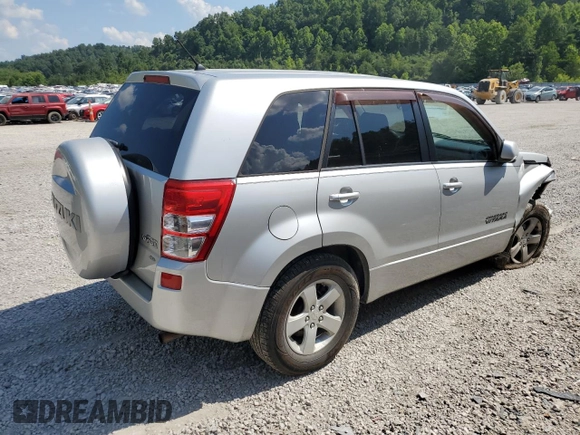 2011 Suzuki Grand Vitara Premium z VIN JS3TD0D29B4103041, wystawiony jako Copart lot #62066985 z przebiegiem 219 727 mil mil oraz Szkoda całkowita • Salvage title. Historia ofert i sprzedaży dostępna na DreamBid. Obrazek 3.