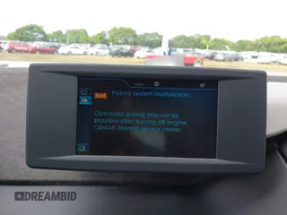 2014 BMW i3 z VIN WBY1Z4C56EVX63285, wystawiony jako IAAI lot #41672245 z przebiegiem 70 229 mil mil oraz . Historia ofert i sprzedaży dostępna na DreamBid. Obrazek 13.