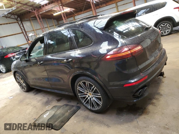 2017 Porsche Cayenne GTS with VIN WP1AD2A25HLA80201, listed as a Copart auction lot 77460464 with 185,501 mi miles and Clean title. Bid and sale history available at DreamBid. Image 2.