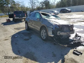 2022 Cadillac XT5 FWD Premium Luxury z VIN 1GYKNCRS8NZ112882, wystawiony jako Copart lot #86999544 z przebiegiem Nie podano mil oraz Szkoda całkowita • Salvage title. Historia ofert i sprzedaży dostępna na DreamBid. Obrazek 4.