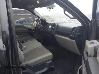 2015 Ford F-150 XLT with VIN 1FTEW1EP2FFB96318, listed as a IAAI auction lot 41578663 with 143,560 mi miles. Bid and sale history available at carsss.com. Image 5.