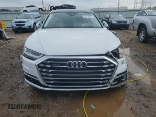 2019 Audi A8 z VIN WAU8DAF87KN018640, wystawiony jako Copart lot #54318975 z przebiegiem Nie podano mil oraz Szkoda całkowita • Salvage title. Historia ofert i sprzedaży dostępna na DreamBid. Obrazek 5.