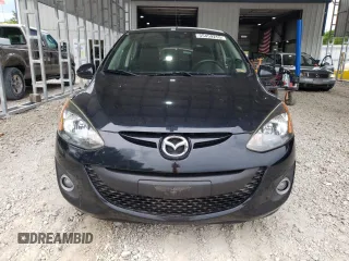 2014 Mazda 2 Touring z VIN JM1DE1LY9E0175946, wystawiony jako Copart lot #55459255 z przebiegiem 109 494 mil mil oraz Szkoda całkowita • Salvage title. Historia ofert i sprzedaży dostępna na DreamBid. Obrazek 5.