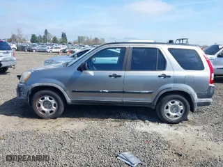 2006 Honda CR-V LX with VIN JHLRD68516C006561, listed as a IAAI auction lot 41855457 with 215,139 mi miles. Bid and sale history available at carsss.com. Image 14.