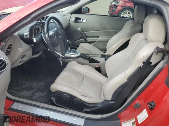 2007 Nissan 350Z Touring z VIN JN1BZ36A87M653584, wystawiony jako Copart lot #85269194 z przebiegiem 57 030 mil mil oraz Szkoda całkowita • Salvage title. Historia ofert i sprzedaży dostępna na DreamBid. Obrazek 7.
