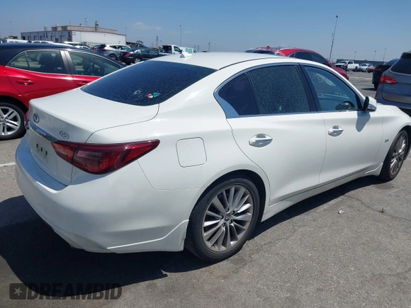 2019 Infiniti Q50 Luxe z VIN JN1EV7AP7KM518276, wystawiony jako IAAI lot #42148033 z przebiegiem 56 720 mil mil oraz . Historia ofert i sprzedaży dostępna na DreamBid. Obrazek 4.