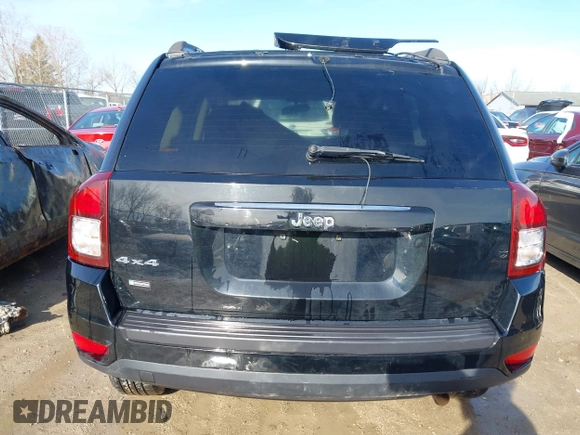 2015 Jeep Compass Sport with VIN 1C4NJDBBXFD114579, listed as a IAAI auction lot 41911501 with 95,732 mi miles and . Bid and sale history available at carsss.com. Image 16.