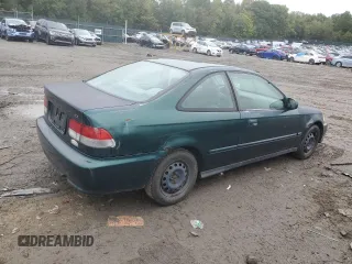1999 Honda Civic EX with VIN 1HGEJ8242XL078968, listed as a Copart auction lot 72958544 with 269,009 mi miles and Salvage Title. Bid and sale history available at carsss.com. Image 3.