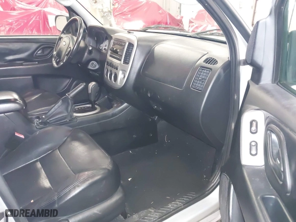 2006 Ford Escape Limited with VIN 1FMCU94116KA13194, listed as a IAAI auction lot 41276569 with 237,273 mi miles. Bid and sale history available at carsss.com. Image 5.