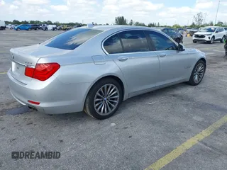 2011 BMW 7 Series 750i with VIN WBAKA8C55BCY36803, listed as a IAAI auction lot 42138401 with 85,464 mi miles. Bid and sale history available at carsss.com. Image 4.